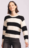 Model smiling in Pink Martini Glynn Sweater, wide horizontal stripes, casual yet polished knit top.
