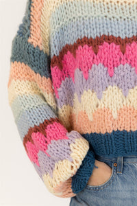 Close-up of sleeve on Lyla + Luxe HANNAH sweater showing handmade texture and bold stripes

