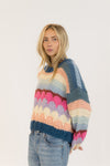 Side angle of HANNAH crewneck showing textured colour-block knit and balloon sleeve

