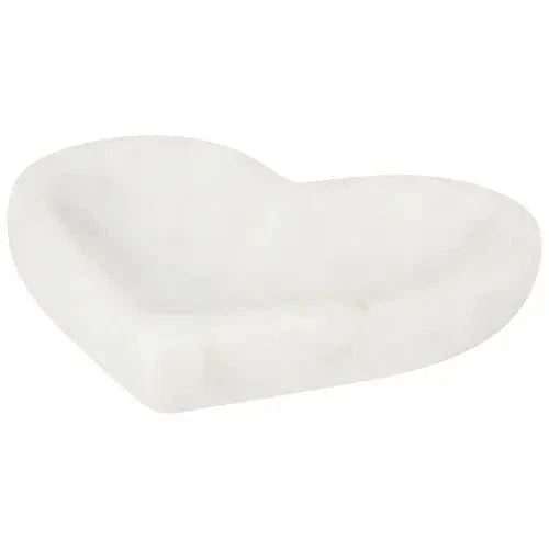 Side angled view of white marble heart-shaped dish showing depth