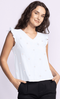 Front view of the Heather Top by Pink Martini, showcasing floral embroidery, a v-neck, and ruffled cap sleeves.