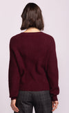 back view of rust Hempden Sweater showing relaxed fit