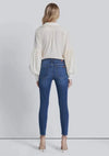 Full back view of high-waisted skinny jeans in a medium wash, featuring a flattering fit and classic back pockets.