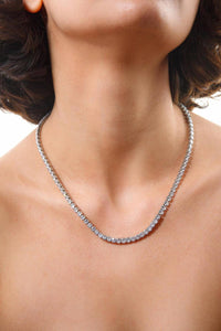Hoopla silver tennis necklace worn close to neckline on model Lemonberry Aurora