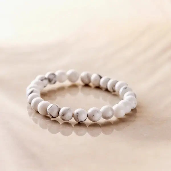 Howlite bracelet by Shiny Soul Creations on neutral surface — matte white with marble veining