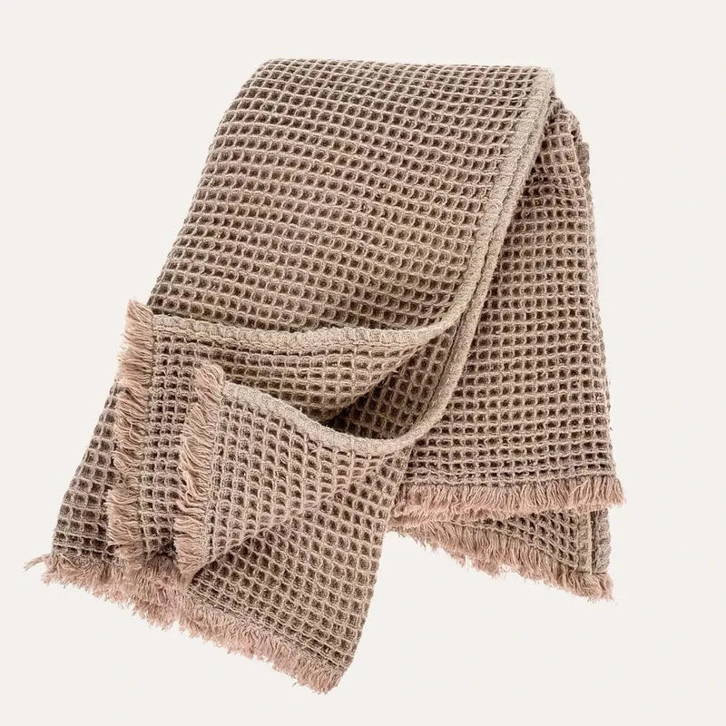 Indaba waffle throw in soft blush pink with thick textured waffle weave and fringe — Lemonberry Aurora