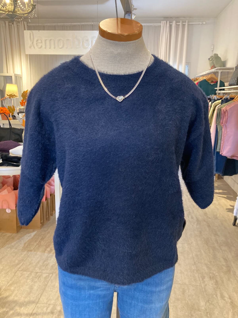 Navy Jenna top by Melissa Nepton on a mannequin in Lemonberry.