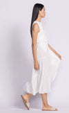 Side view of the Jennifer Dress by Pink Martini, showing its tiered silhouette and flattering midi length.
