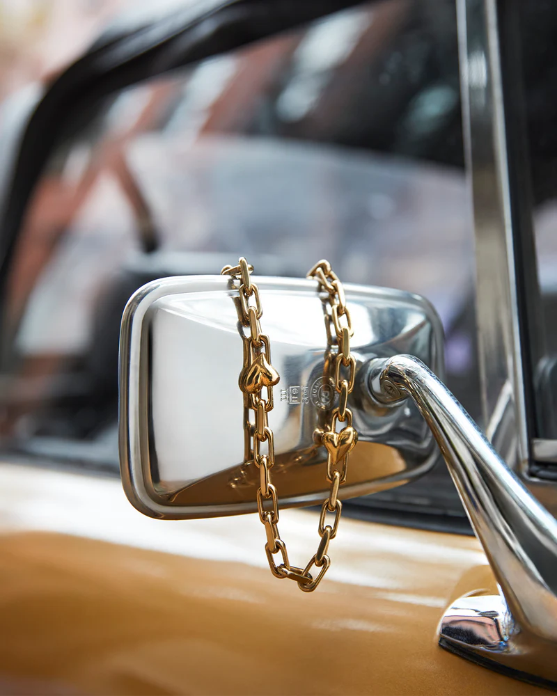 Jenny Bird Art Heart Chain Necklace styled on vintage car mirror, gold finish