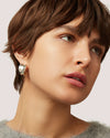 Jenny Bird Chunky Doune Hoop Earrings in silver plated brass — Lemonberry Aurora on model with her head tilted
