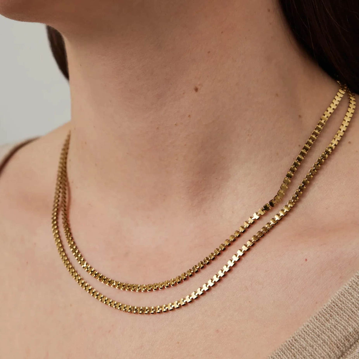 Jenny Bird Double Amalfi high-polish gold necklace front view on model Lemonberry Aurora