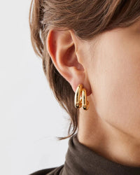 Jenny Bird Florence Earrings in gold — right ear close-up, Lemonberry Aurora.