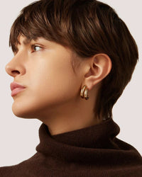 Jenny Bird Florence Earrings in gold — left ear view, Lemonberry Aurora.