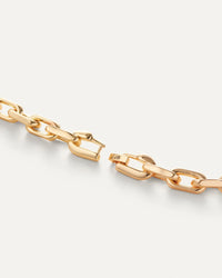 Detail of the Jenny Bird Loire gold bracelet foldover clasp and JB logo