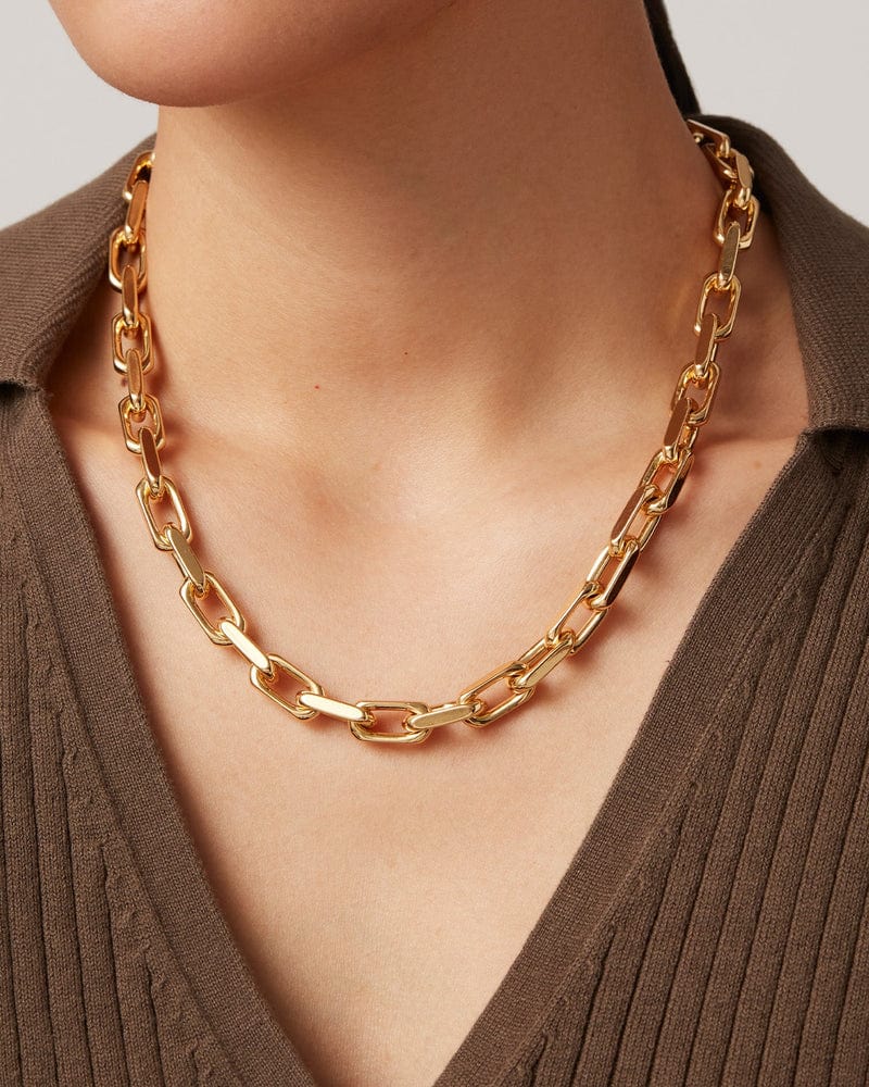 Jenny Bird Loire Necklace in gold, worn by a person against a neutral background