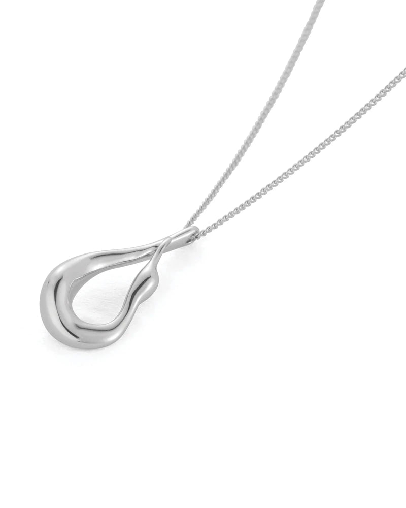 Jenny Bird Mini Egret Pendant Necklace in silver — close-up of sculpted teardrop, Lemonberry Aurora.