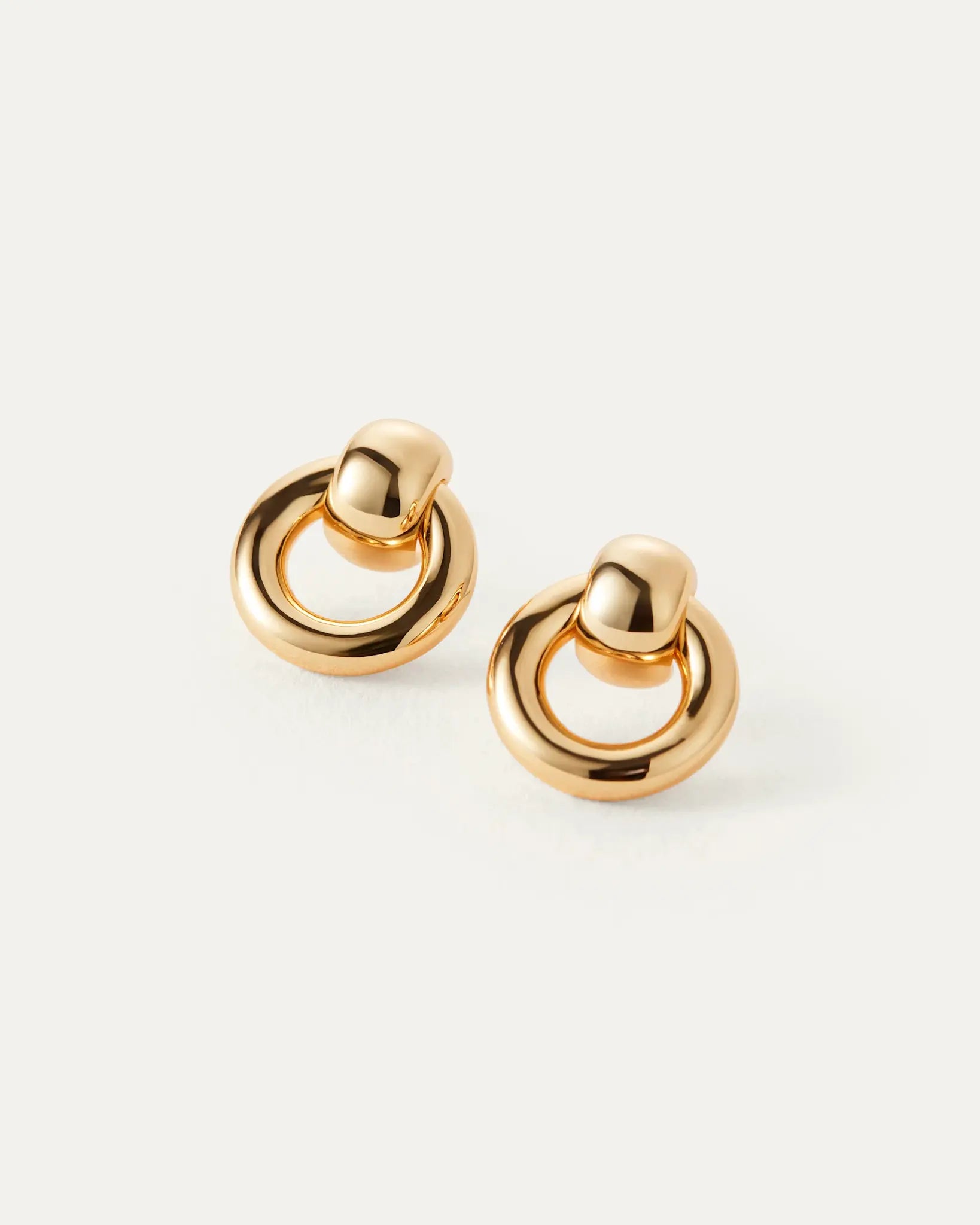 Front view of Jenny Bird Mini Puffy Faye Knocker Earrings in high-polish gold