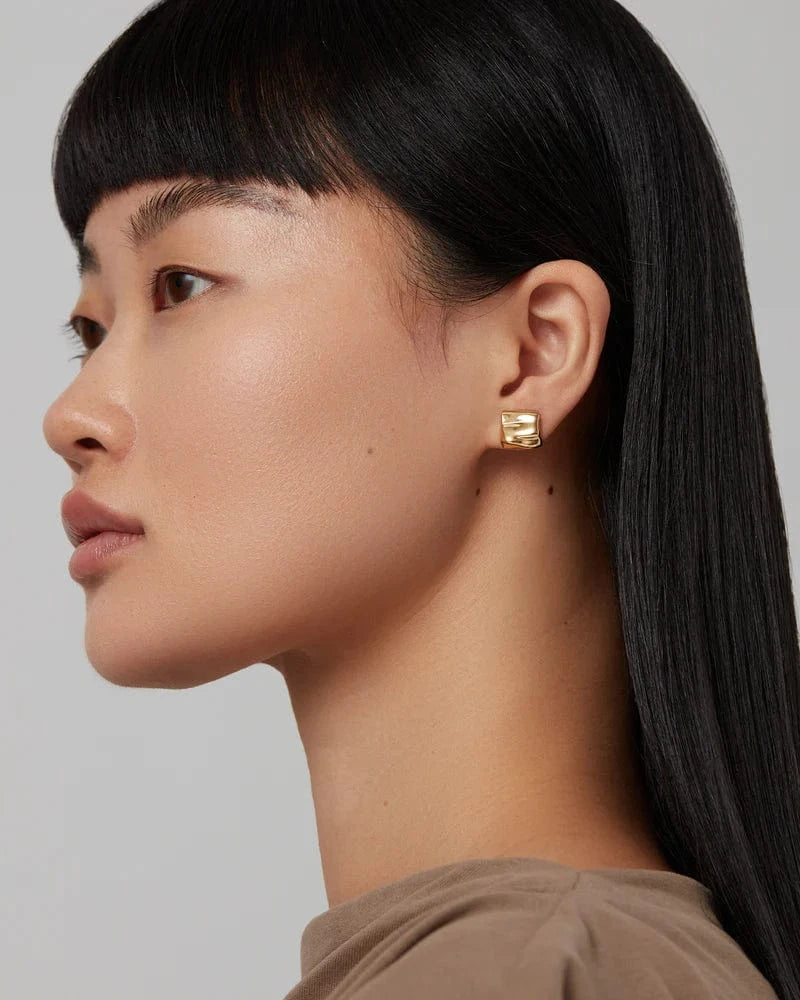 Jenny Bird Mini Sundra Earrings in gold — worn on model ear, Lemonberry Aurora.
