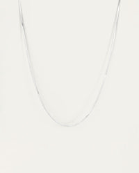 Jenny Bird Zeina Slim Chain silver herringbone necklace shown flat on a light background