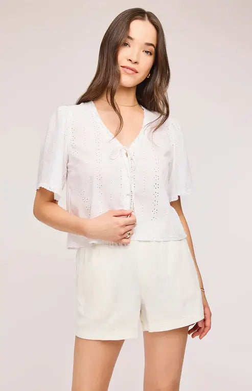 Close-up of Gentle Fawn Jessa Top featuring tie-front neckline and puff sleeves