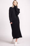 Front view of Josie Skirt by Pink Martini in black, flowy pleated knit design
