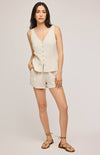 Jules Tank by Gentle Fawn in linen blend, front view styled from a distance with shorts and strappy sandals
