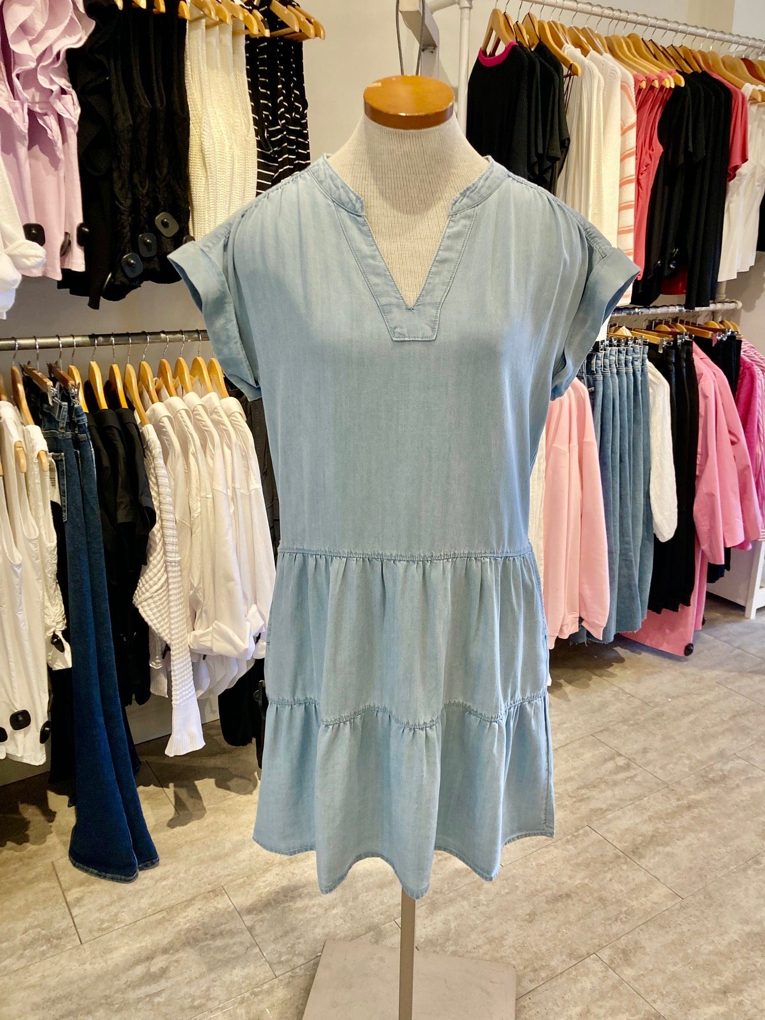 Close-up front detail of the Juliet Dress by Melissa Nepton in lightweight denim look

