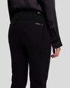 Close-up of the back of Kimmie Straight B(Air) jeans, featuring the subtle pocket stitching and smooth black denim finish.