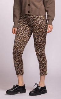 Side view of Kitty Pants showing fitted ankle silhouette and leopard pattern