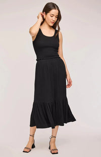 Full-body view of model wearing the Gentle Fawn Layla Tank and Elaine Skirt in black. A chic, coordinated set with a textured knit finish.