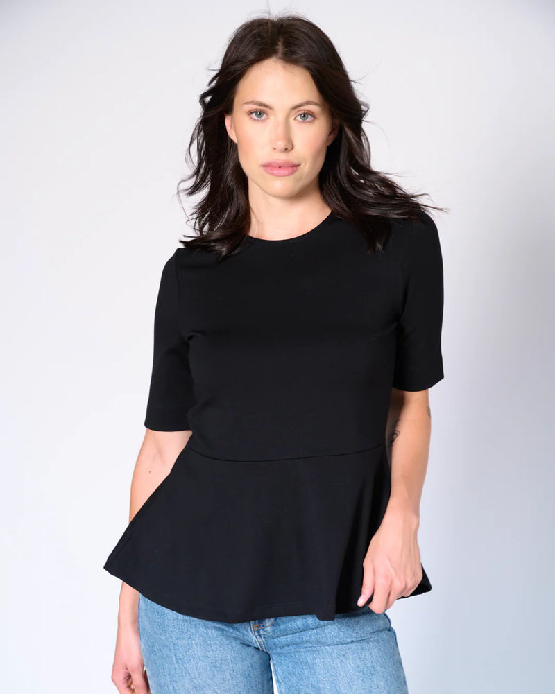 Front view of Lisa Peplum Top by Preloved in black, styled with jeans at Lemonberry Aurora