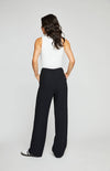 The Lottie Pant in black, full back view from a distance, showing the relaxed fit and tailored details. Available at Lemonberry, Aurora, ON