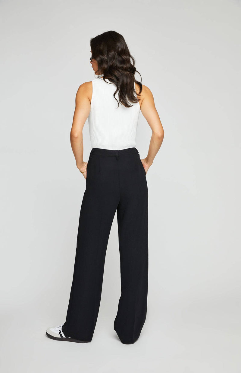 The Lottie Pant in black, full back view from a distance, showing the relaxed fit and tailored details. Available at Lemonberry, Aurora, ON