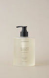 Lovefresh Everyday Wash – Mandarin & Cypress bottle on light countertop.
