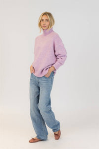 Mid-shot of Lyla & Luxe Aggie pink mix turtleneck sweater, relaxed fit