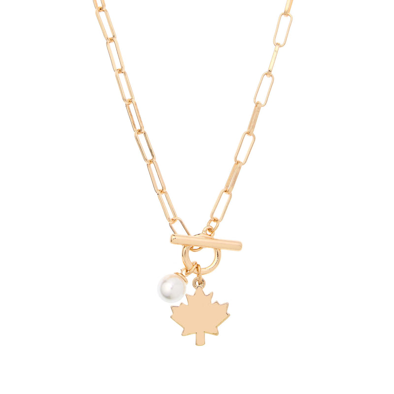 Isolated product shot of Maple Leaf Toggle Necklace in gold with pearl charm by Foxy Originals