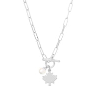 Isolated product shot of Maple Leaf Toggle Necklace in silver with pearl charm by Foxy Originals