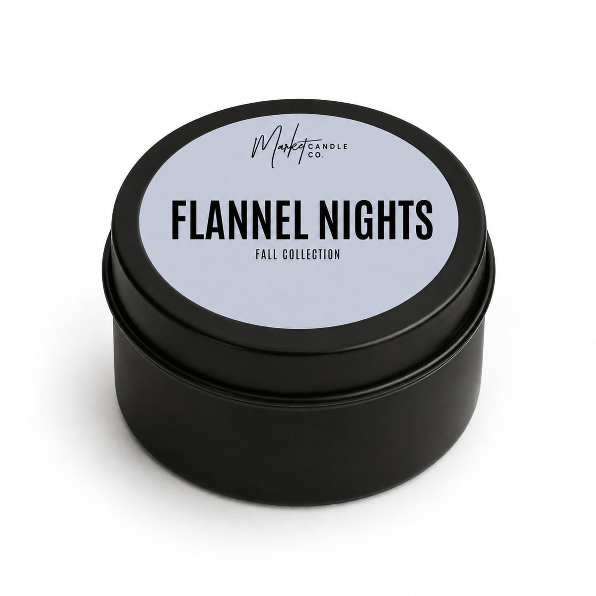 Market Candle Company Flannel Nights mini soy candle in a black tin with a pale blue label