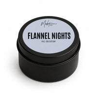 Market Candle Company Flannel Nights mini soy candle in a black tin with a pale blue label