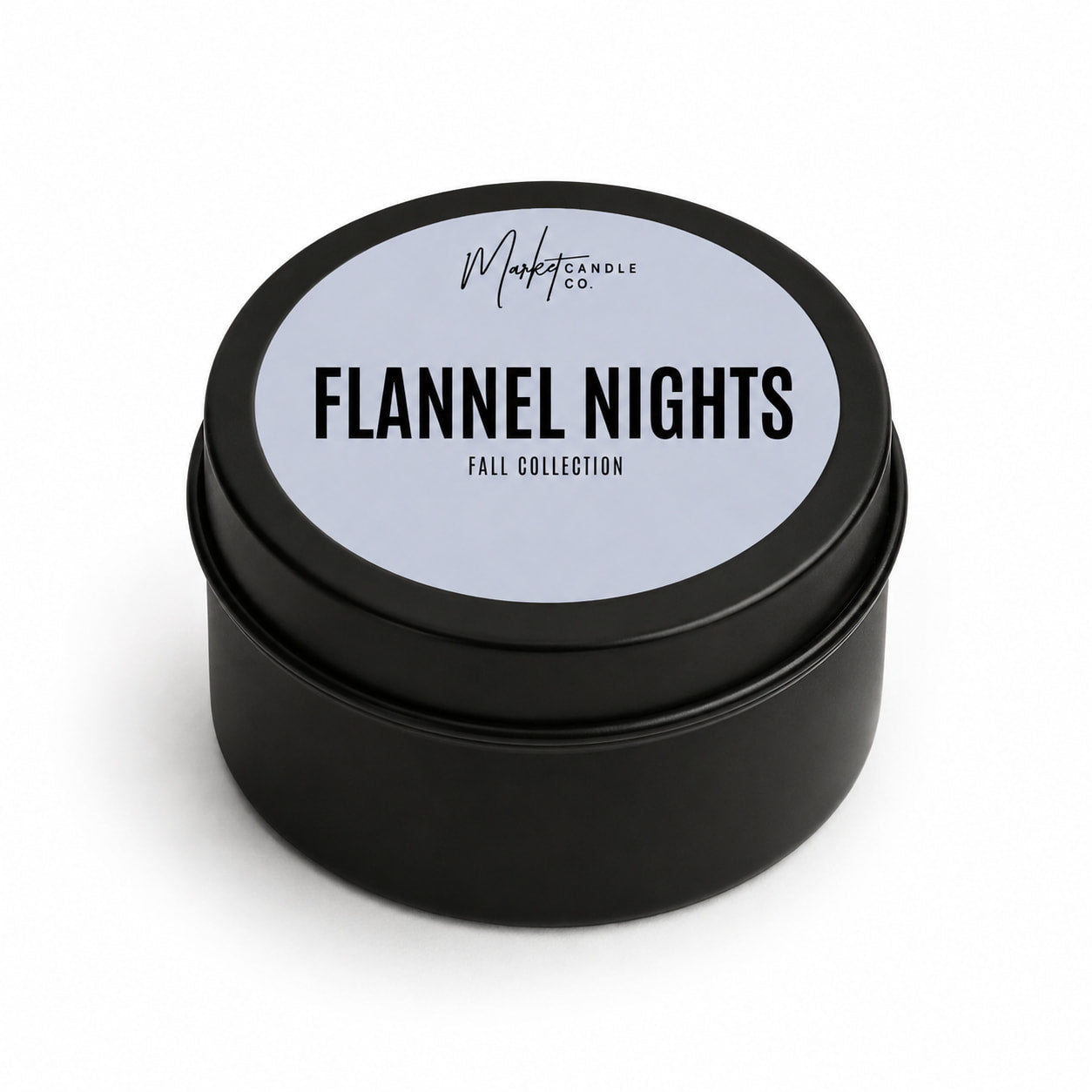 Market Candle Company Flannel Nights mini soy candle in a black tin with a pale blue label