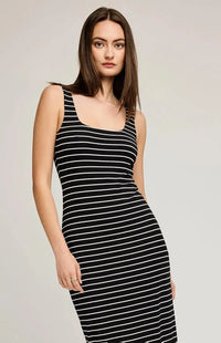 Model with a front pose of the striped dress by Gentle Fawn - shop online in Ontario from Lemonberry