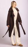 Side view of Martha Sweater in brown by Pink Martini, cozy longline knit with tie belt