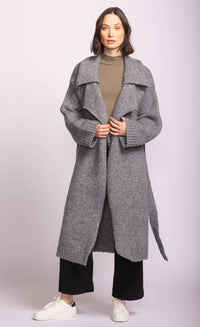 Model wearing Martha Sweater in grey by Pink Martini, belted long cardigan with draped collar
