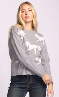 Side angle of the Meadow Sweater showing prancing horse print on soft grey knit.