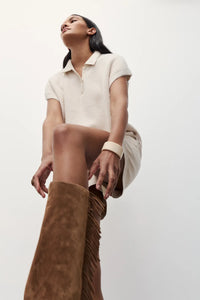 Melissa Nepton Lydie cream short sleeve polo sweater styled with boots