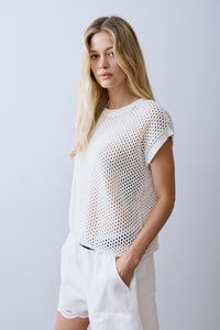 Another side view of Melissa Nepton Nolan open knit off white short sleeve top