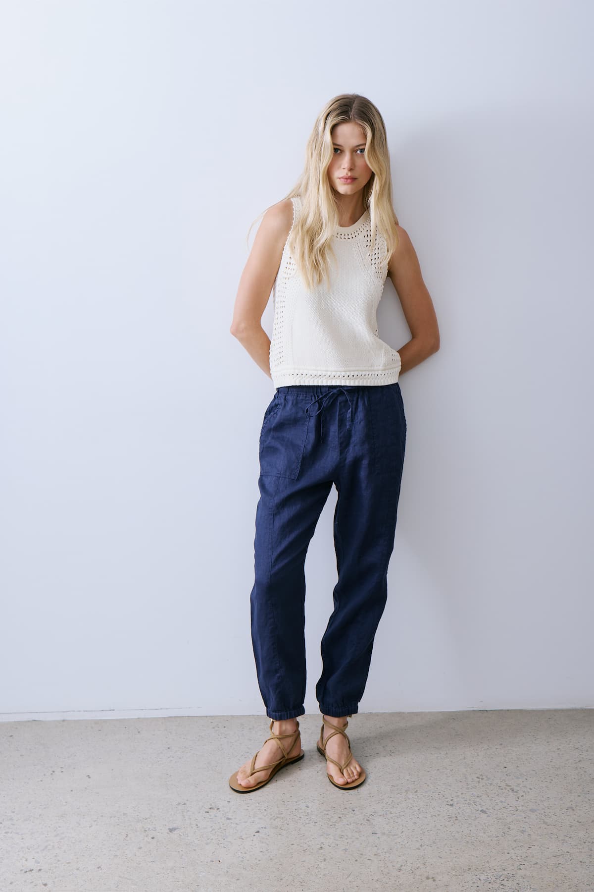 Melissa Nepton River sleeveless knit in Off White, lightweight cotton texture styled with navy trousers at Lemonberry Aurora