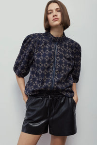 Melissa Nepton Xena navy printed puff sleeve blouse with black shorts