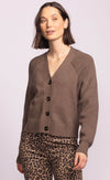 Side angle of the Monterey Sweater in soft taupe, relaxed fit cardigan styled with leopard print trousers.