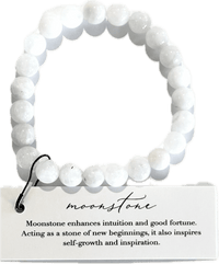 White beaded bracelet on a card with moonstone information